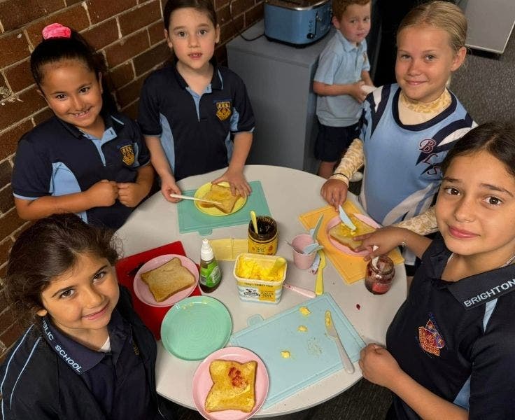 BLSPS Breakfast Club with 5 children spreading toast