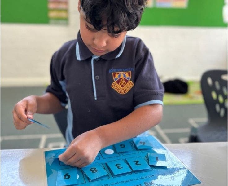 Student doing a numbers activity